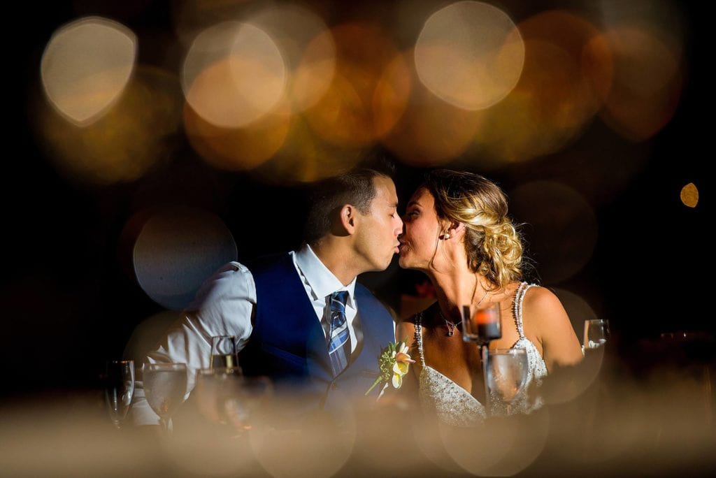 bride and groom kissing at hyatt maui