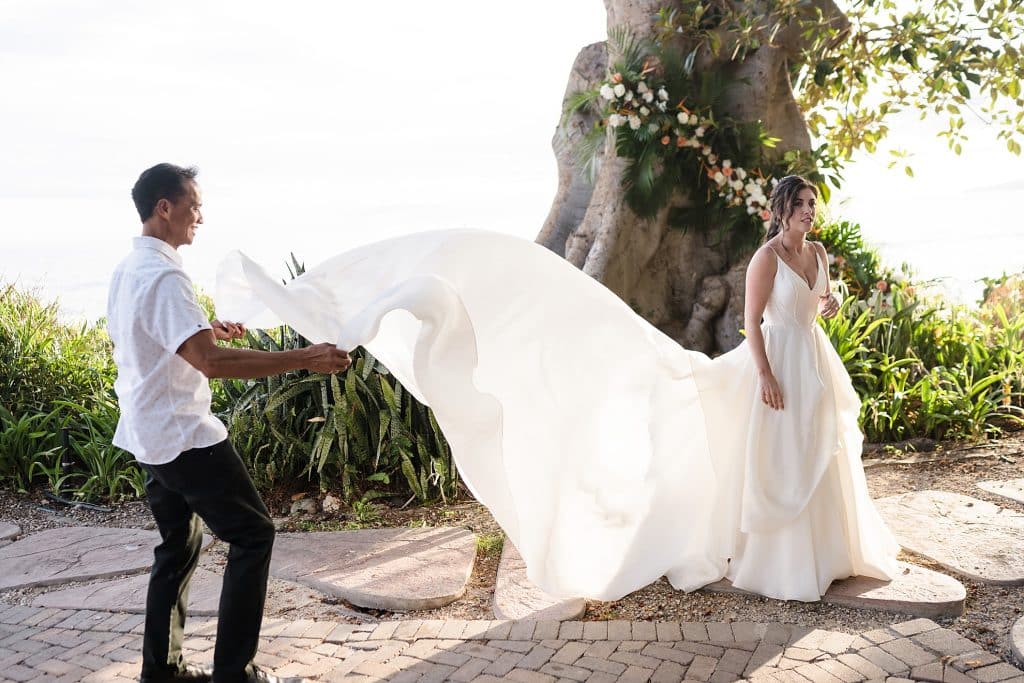 best-wedding-coordinators-on-maui-helping-bride-with-dress